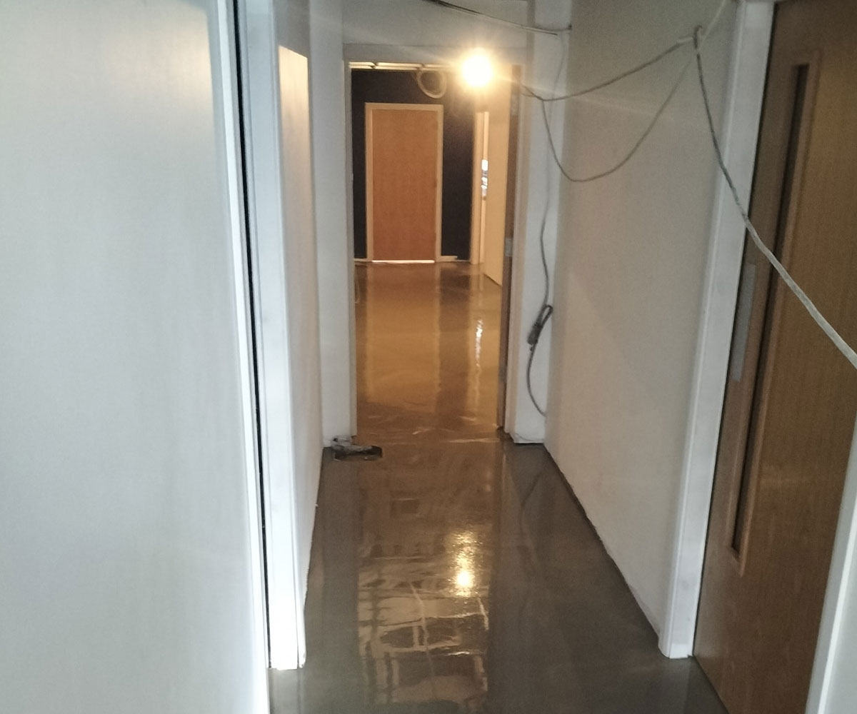 Polished concrete flooring reflecting light